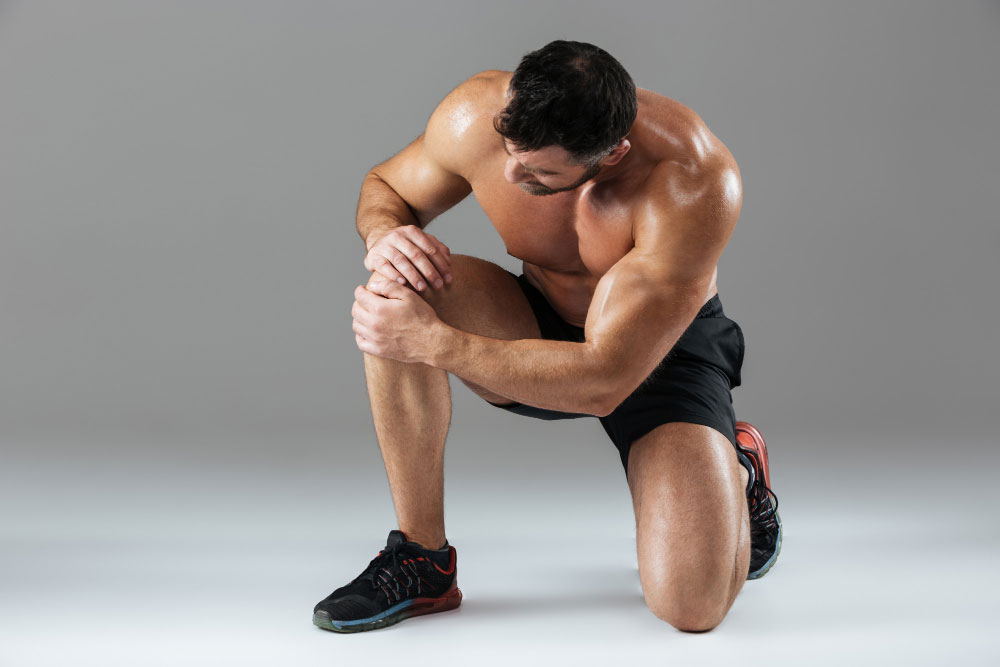 portrait strong muscular male bodybuilder Sports Medicine Sports Medicine,Pain Management,Noracare Wellness